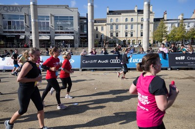 061019 - Cardiff Half Marathon 2019 - Runners make their way through Cardiff Bay, Roald Dahl Plas and past the Wales Millennium Centre at the halfway point of the race