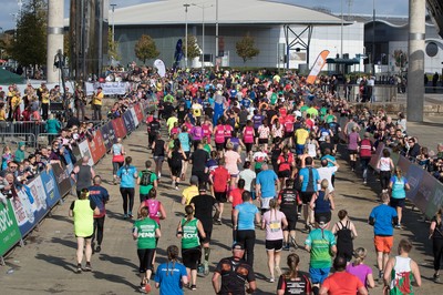 061019 - Cardiff Half Marathon 2019 - Runners make their way through Cardiff Bay, Roald Dahl Plas and past the Wales Millennium Centre at the halfway point of the race