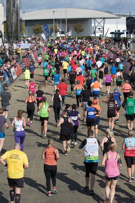 061019 - Cardiff Half Marathon 2019 - Runners make their way through Cardiff Bay, Roald Dahl Plas and past the Wales Millennium Centre at the halfway point of the race