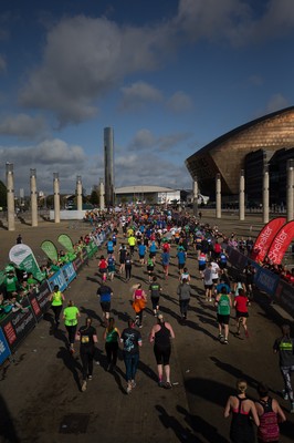 061019 - Cardiff Half Marathon 2019 - Runners make their way through Cardiff Bay, Roald Dahl Plas and past the Wales Millennium Centre at the halfway point of the race