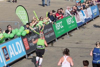 061019 - Cardiff Half Marathon 2019 - Runners make their way through Cardiff Bay, Roald Dahl Plas and past the Wales Millennium Centre at the halfway point of the race