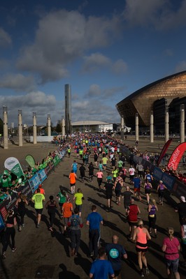 061019 - Cardiff Half Marathon 2019 - Runners make their way through Cardiff Bay, Roald Dahl Plas and past the Wales Millennium Centre at the halfway point of the race