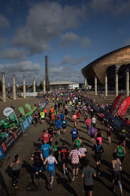 061019 - Cardiff Half Marathon 2019 - Runners make their way through Cardiff Bay, Roald Dahl Plas and past the Wales Millennium Centre at the halfway point of the race