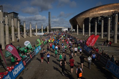 061019 - Cardiff Half Marathon 2019 - Runners make their way through Cardiff Bay, Roald Dahl Plas and past the Wales Millennium Centre at the halfway point of the race