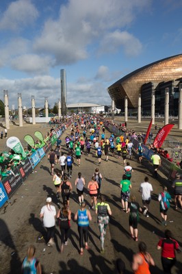 061019 - Cardiff Half Marathon 2019 - Runners make their way through Cardiff Bay, Roald Dahl Plas and past the Wales Millennium Centre at the halfway point of the race