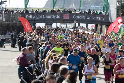 061019 - Cardiff Half Marathon 2019 - Runners make their way through Cardiff Bay, Roald Dahl Plas and past the Wales Millennium Centre at the halfway point of the race