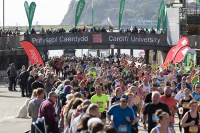 061019 - Cardiff Half Marathon 2019 - Runners make their way through Cardiff Bay, Roald Dahl Plas and past the Wales Millennium Centre at the halfway point of the race