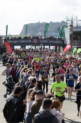 061019 - Cardiff Half Marathon 2019 - Runners make their way through Cardiff Bay, Roald Dahl Plas and past the Wales Millennium Centre at the halfway point of the race