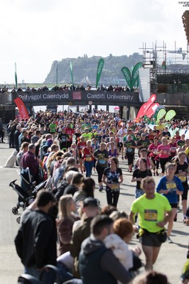 061019 - Cardiff Half Marathon 2019 - Runners make their way through Cardiff Bay, Roald Dahl Plas and past the Wales Millennium Centre at the halfway point of the race