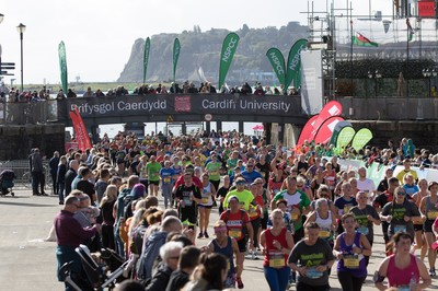 061019 - Cardiff Half Marathon 2019 - Runners make their way through Cardiff Bay, Roald Dahl Plas and past the Wales Millennium Centre at the halfway point of the race