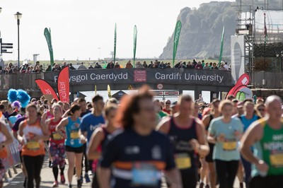 061019 - Cardiff Half Marathon 2019 - Runners make their way through Cardiff Bay, Roald Dahl Plas and past the Wales Millennium Centre at the halfway point of the race