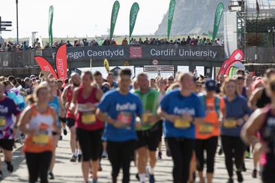 061019 - Cardiff Half Marathon 2019 - Runners make their way through Cardiff Bay, Roald Dahl Plas and past the Wales Millennium Centre at the halfway point of the race