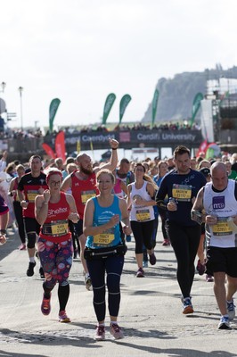 061019 - Cardiff Half Marathon 2019 - Runners make their way through Cardiff Bay, Roald Dahl Plas and past the Wales Millennium Centre at the halfway point of the race