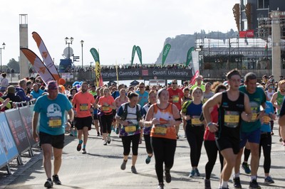 061019 - Cardiff Half Marathon 2019 - Runners make their way through Cardiff Bay, Roald Dahl Plas and past the Wales Millennium Centre at the halfway point of the race