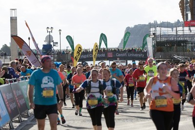 061019 - Cardiff Half Marathon 2019 - Runners make their way through Cardiff Bay, Roald Dahl Plas and past the Wales Millennium Centre at the halfway point of the race