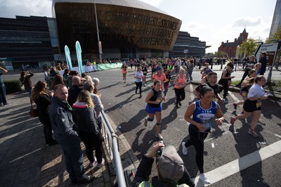 061019 - Cardiff Half Marathon 2019 - Runners make their way through Cardiff Bay, Roald Dahl Plas and past the Wales Millennium Centre at the halfway point of the race