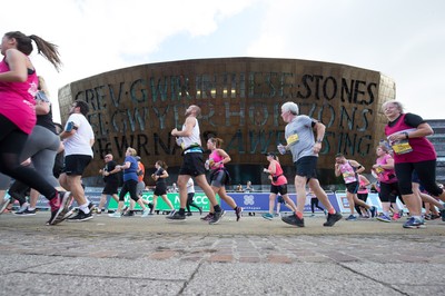 061019 - Cardiff Half Marathon 2019 - Runners make their way through Cardiff Bay, Roald Dahl Plas and past the Wales Millennium Centre at the halfway point of the race