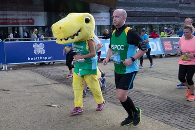 061019 - Cardiff Half Marathon 2019 - Runners make their way through Cardiff Bay, Roald Dahl Plas and past the Wales Millennium Centre at the halfway point of the race