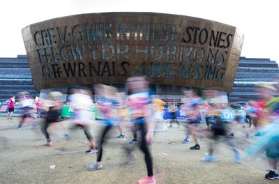 061019 - Cardiff Half Marathon 2019 - Runners make their way through Cardiff Bay, Roald Dahl Plas and past the Wales Millennium Centre at the halfway point of the race