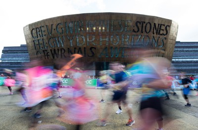 061019 - Cardiff Half Marathon 2019 - Runners make their way through Cardiff Bay, Roald Dahl Plas and past the Wales Millennium Centre at the halfway point of the race