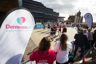 061019 - Cardiff Half Marathon 2019 - Runners make their way through Cardiff Bay, Roald Dahl Plas and past the Wales Millennium Centre at the halfway point of the race