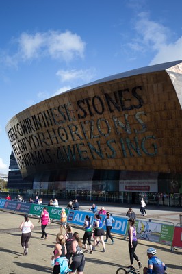 061019 - Cardiff Half Marathon 2019 - Runners make their way through Cardiff Bay, Roald Dahl Plas and past the Wales Millennium Centre at the halfway point of the race