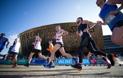 061019 - Cardiff Half Marathon 2019 - Runners make their way through Cardiff Bay, Roald Dahl Plas and past the Wales Millennium Centre at the halfway point of the race