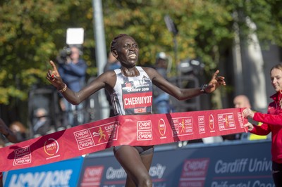 061019 - Cardiff Half Marathon -   Women's winner Lucy Cheruiyot crosses the line