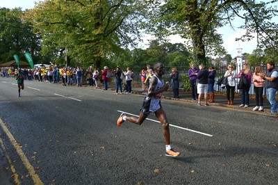 061019 - Cardiff University Cardiff Half Marathon - Runners pass Roath Park Lake