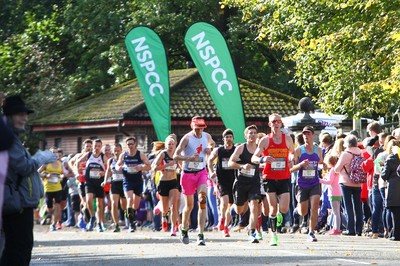 061019 - Cardiff University Cardiff Half Marathon - Runners pass Roath Park Lake