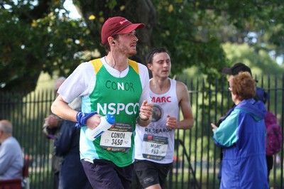 061019 - Cardiff University Cardiff Half Marathon - Runners pass Roath Park Lake