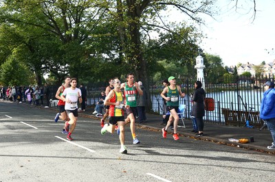 061019 - Cardiff University Cardiff Half Marathon - Runners pass Roath Park Lake