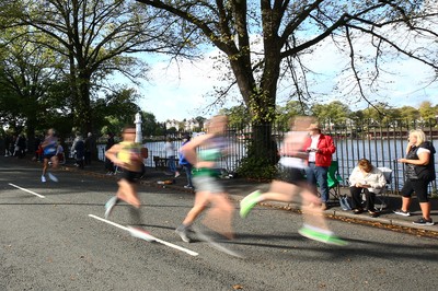 061019 - Cardiff University Cardiff Half Marathon - Runners pass Roath Park Lake