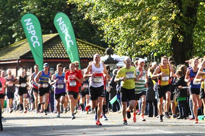 061019 - Cardiff University Cardiff Half Marathon - Runners pass Roath Park Lake