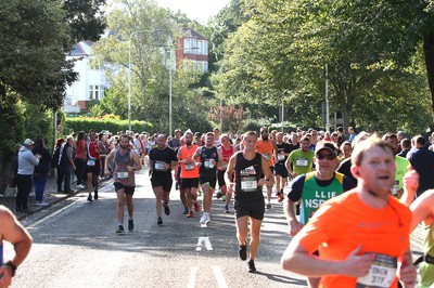 061019 - Cardiff University Cardiff Half Marathon - Runners pass Roath Park Lake