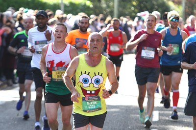 061019 - Cardiff University Cardiff Half Marathon - Runners pass Roath Park Lake