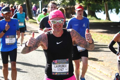 061019 - Cardiff University Cardiff Half Marathon - Runners pass Roath Park Lake