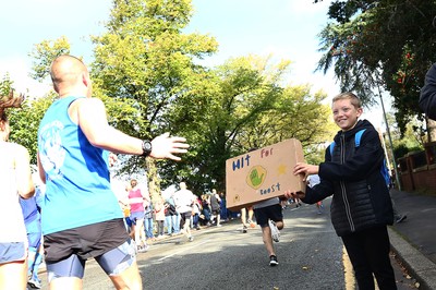 061019 - Cardiff University Cardiff Half Marathon - Runners pass Roath Park Lake