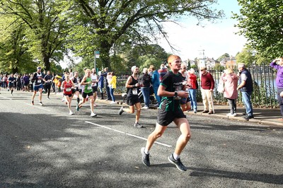 061019 - Cardiff University Cardiff Half Marathon - Runners pass Roath Park Lake