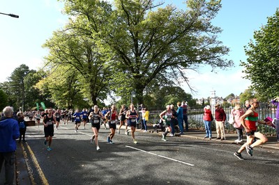 061019 - Cardiff University Cardiff Half Marathon - Runners pass Roath Park Lake