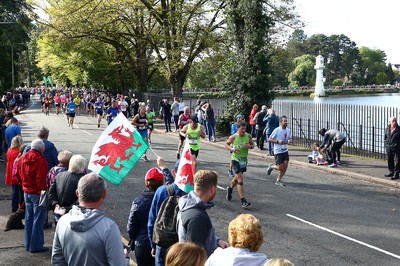 061019 - Cardiff University Cardiff Half Marathon - Runners pass Roath Park Lake