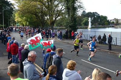 061019 - Cardiff University Cardiff Half Marathon - Runners pass Roath Park Lake