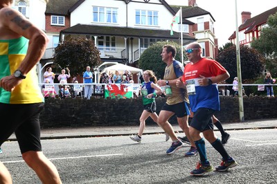 061019 - Cardiff University Cardiff Half Marathon - Runners pass Roath Park Lake