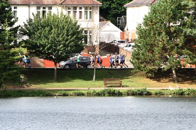 061019 - Cardiff University Cardiff Half Marathon - Runners pass Roath Park Lake