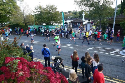 061019 - Cardiff University Cardiff Half Marathon - Runners pass Roath Park Lake