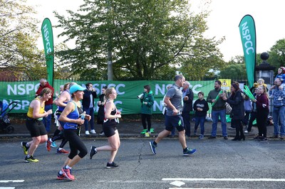 061019 - Cardiff University Cardiff Half Marathon - Runners pass Roath Park Lake