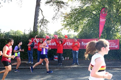 061019 - Cardiff University Cardiff Half Marathon - Runners pass Roath Park Lake