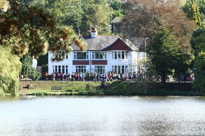 061019 - Cardiff University Cardiff Half Marathon - Runners pass Roath Park Lake