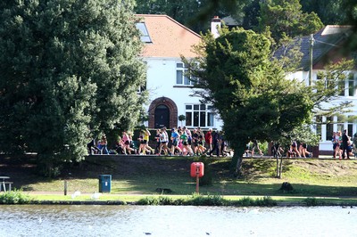 061019 - Cardiff University Cardiff Half Marathon - Runners pass Roath Park Lake