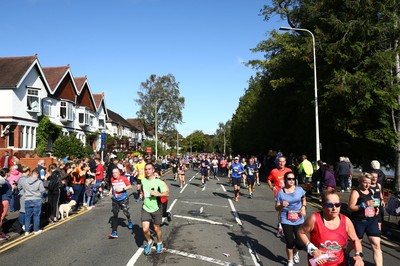 061019 - Cardiff University Cardiff Half Marathon - Runners pass Roath Park Lake